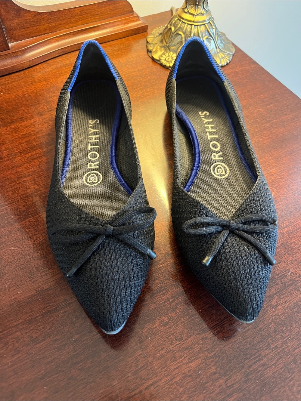 Rothy's Black Pointed Knit Ballet Flat with Bow Accent